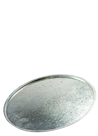 Circular metal base plate against a white background